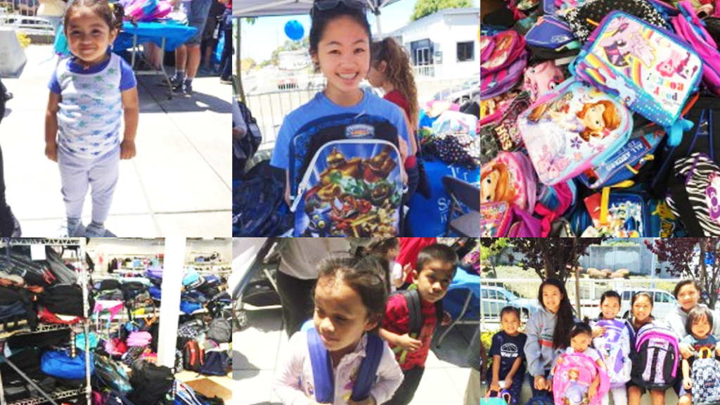 Kids holding backpacks