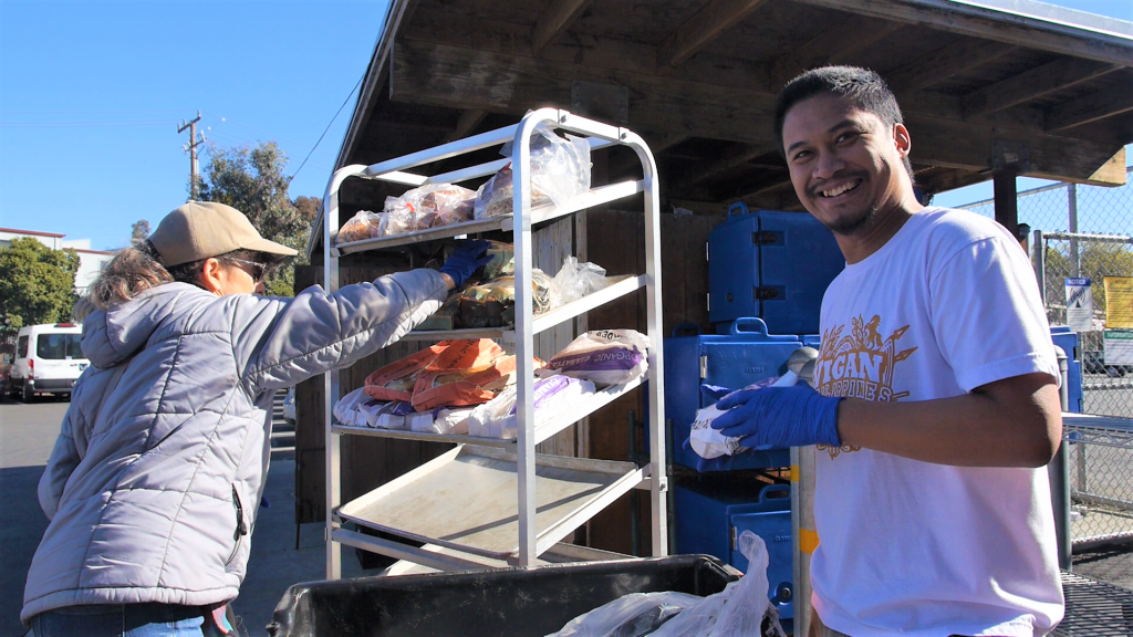 Volunteers stocking shelves