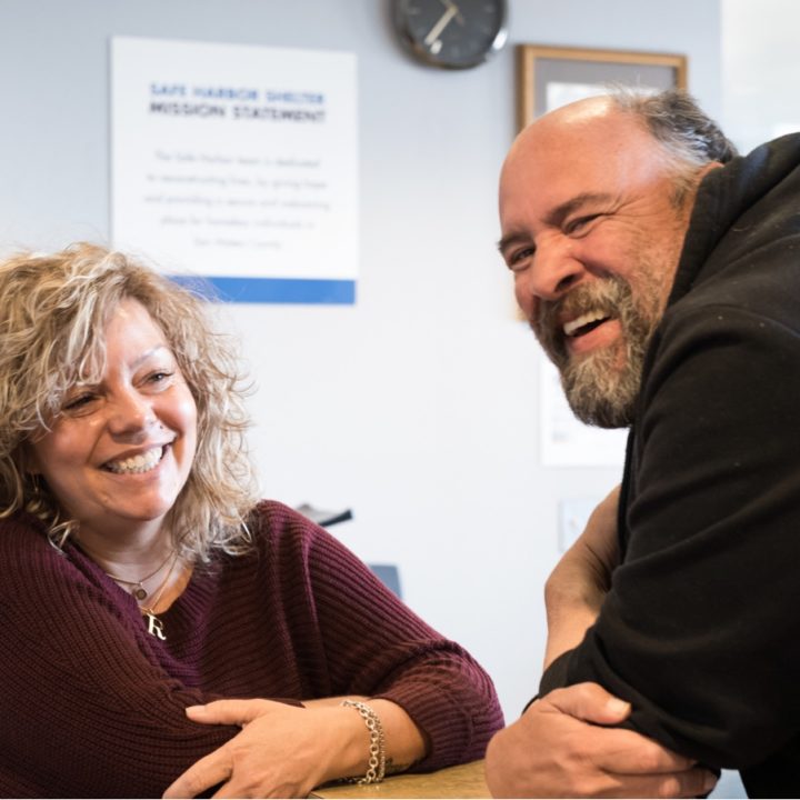 Man and woman smiling