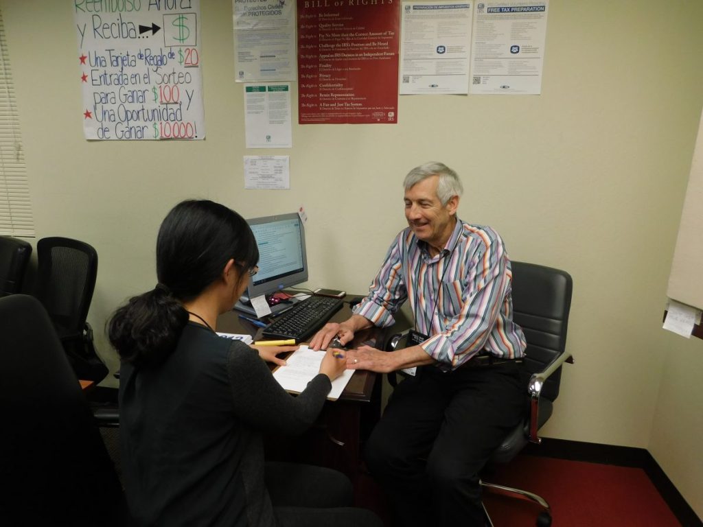 A trained volunteer tax preparer helps an individual claim their maximum tax benefit and refund